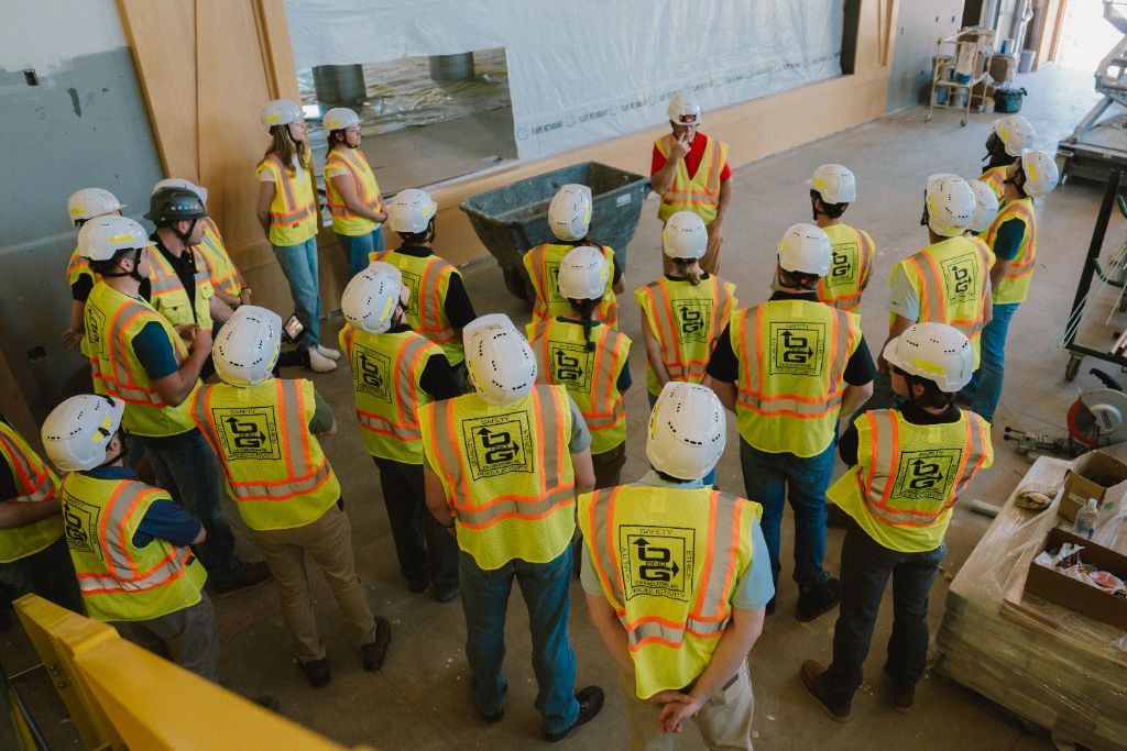 Team of construction workers and engineers on site